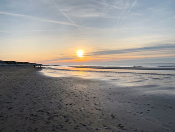 Scenic view of beach during sunset