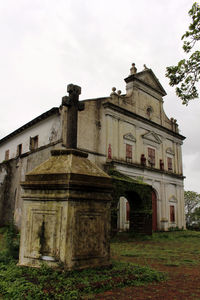 Low angle view of old building against sky