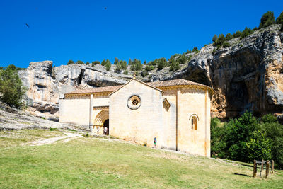 Historic building against clear blue sky