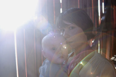 Portrait of mother and daughter outdoors