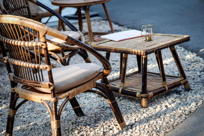 Empty chairs and table at restaurant