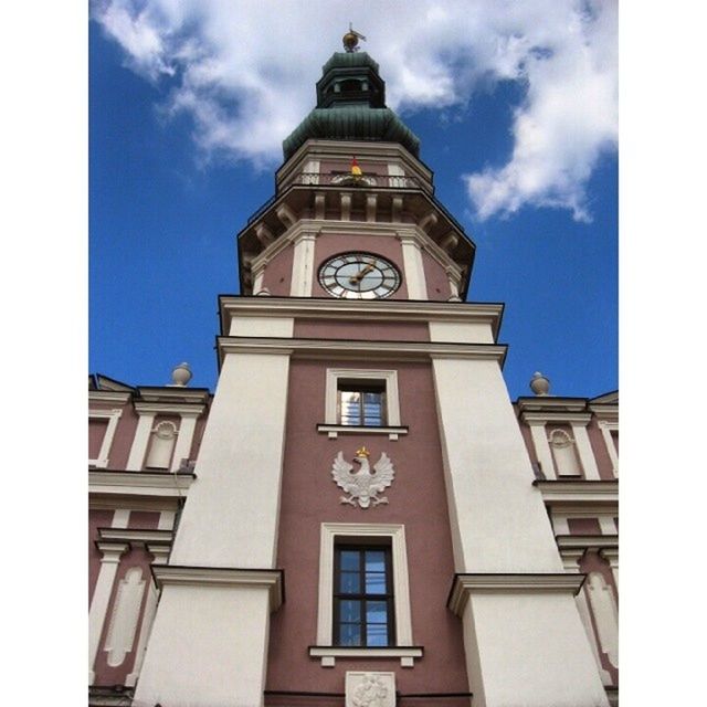 architecture, building exterior, built structure, low angle view, clock tower, religion, tower, church, sky, clock, window, transfer print, place of worship, tall - high, spirituality, time, auto post production filter, facade