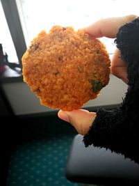 Close-up of woman holding ice cream