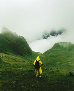 Rear view of man on mountain road