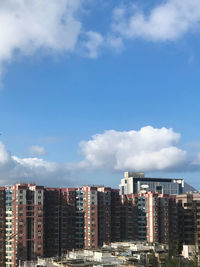 Modern buildings against blue sky