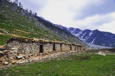 Scenic view of landscape against cloudy sky