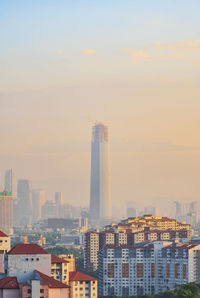 High angle view of buildings in city against sky