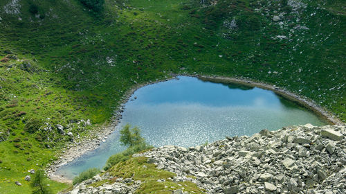 High angle view of lake amidst trees