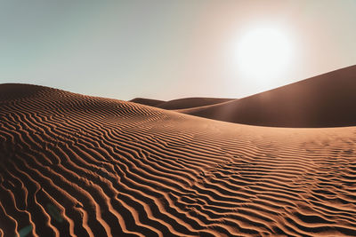 Scenic view of desert against clear sky