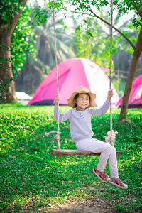 Portrait of a smiling girl holding umbrella