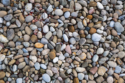 Full frame shot of pebbles at beach