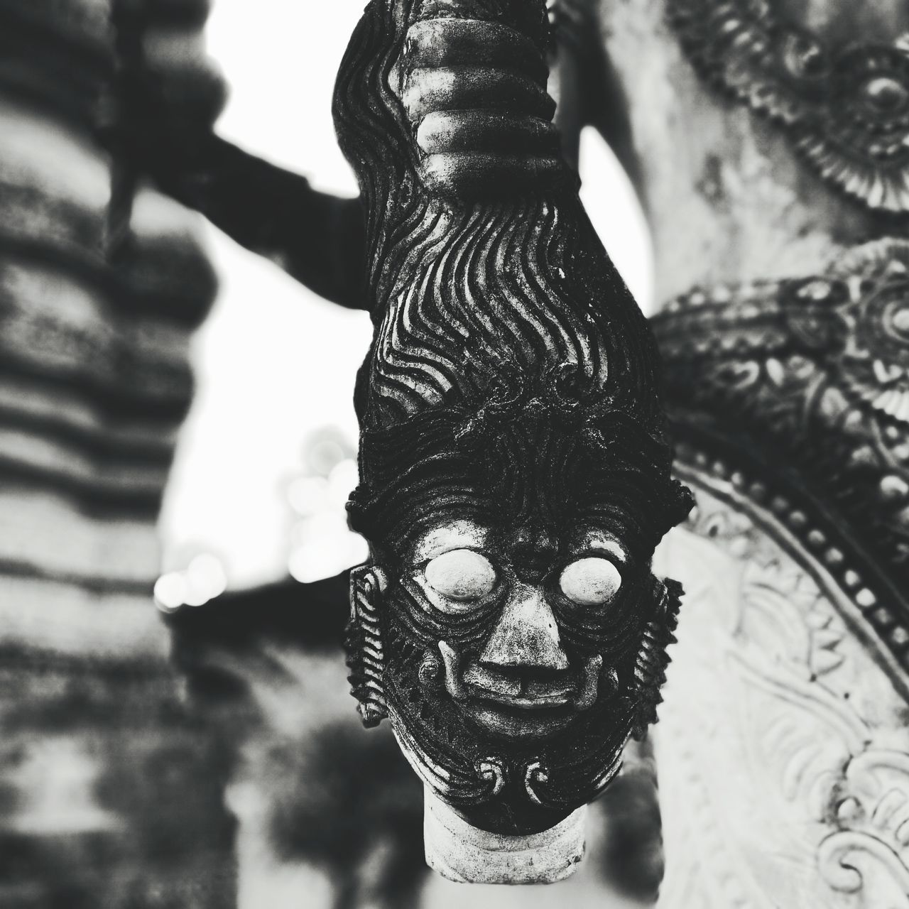 CLOSE-UP OF STATUE OF BUDDHA