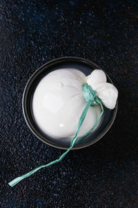 High angle view of white rose on table