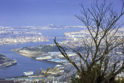 Scenic view of sea and buildings against sky