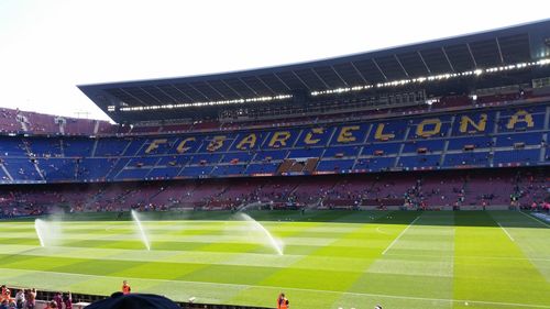 Low angle view of soccer field against sky