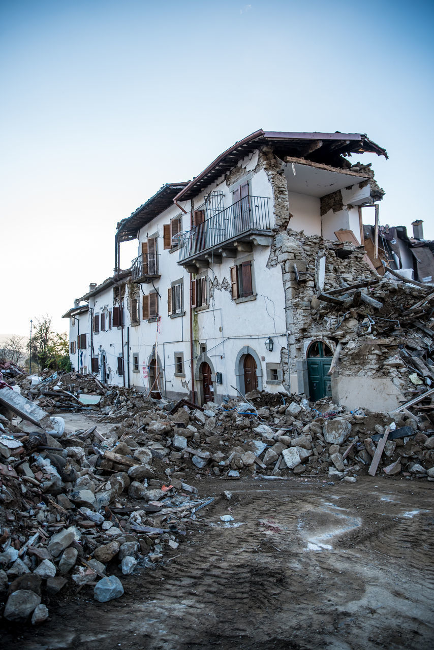 DAMAGED BUILDING AGAINST SKY