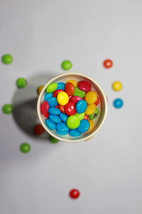 High angle view of multi colored balls on table