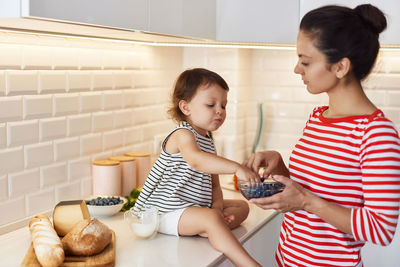 Mother and daughter at home