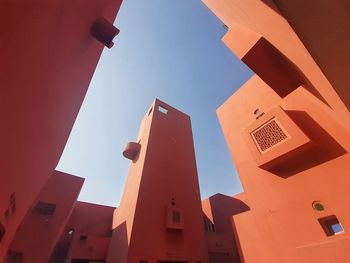 Low angle view of buildings against clear sky