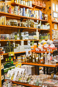 Close-up of bottles on display at store