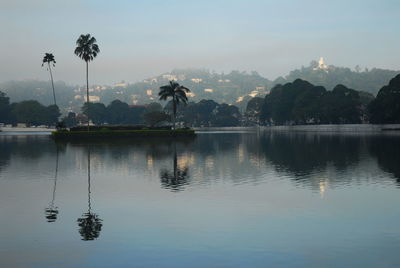 Scenic view of lake with mountains in background
