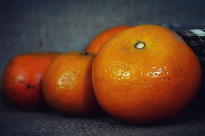 Close-up of orange slices on table