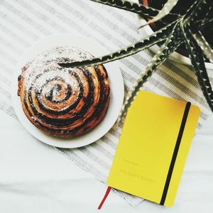High angle view of coffee served on table