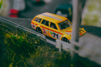 Close-up of car on field