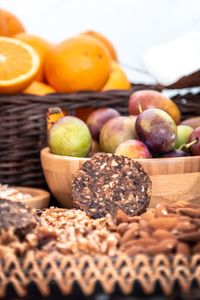 Close-up of fruits in basket on table