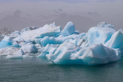 Iceland, jokulsarlon lagoon, turquoise icebergs floating in glacier lagoon on iceland