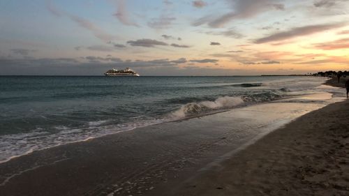 Scenic view of sea against sky during sunset