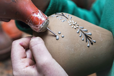 Close-up of hands working