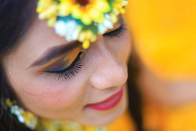 Close-up young woman during haldi ceremony