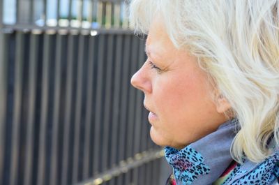 Close-up portrait of a woman looking away