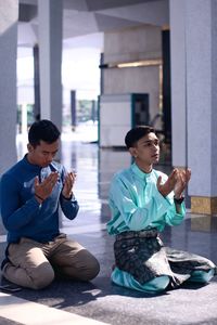 Men praying in mosque