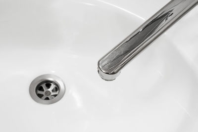 High angle view of faucet in bathroom