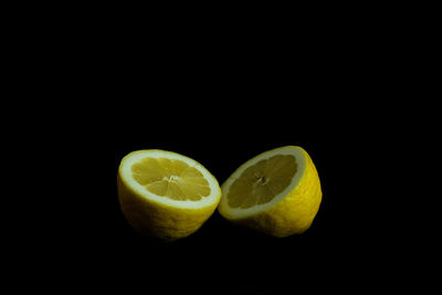 Close-up of fruits against black background