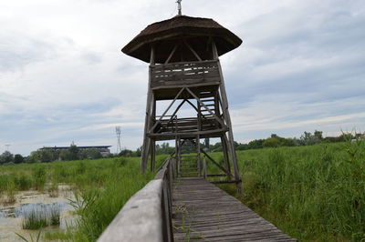 Built structure against cloudy sky