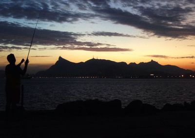 Silhouette of mountain at sunset