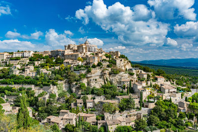 Buildings in city against sky