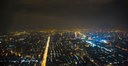 Aerial view of illuminated cityscape