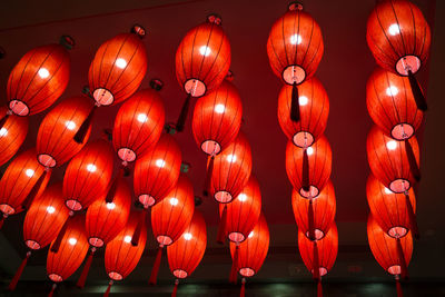 Low angle view of illuminated lanterns hanging