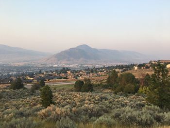 View of a field with mountain range in the background