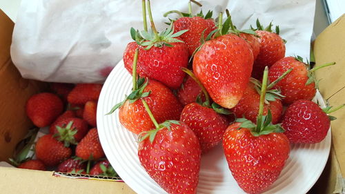 High angle view of strawberries on table