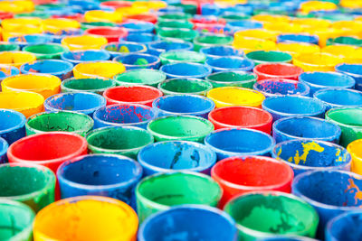 Full frame shot of multi colored drinking glasses