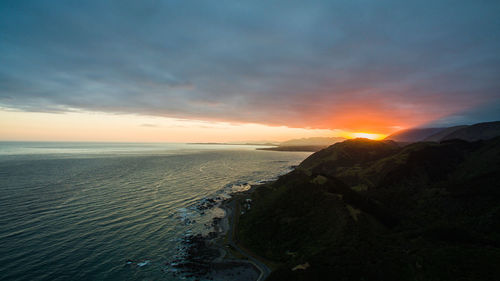 Scenic view of sea against sky during sunset