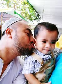 Portrait of father and son
