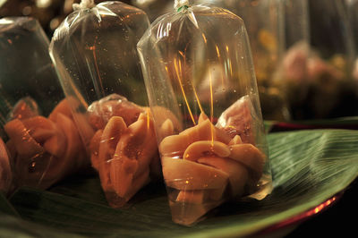 Close-up of fish in glass on table