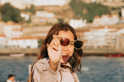 Young woman wearing sunglasses