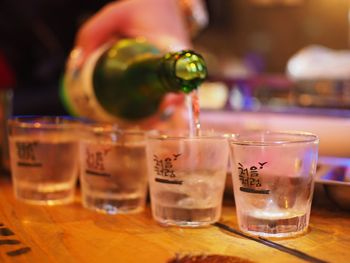 Close-up of beer glass on table